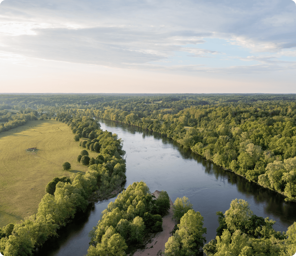 River winding through lush green landscape