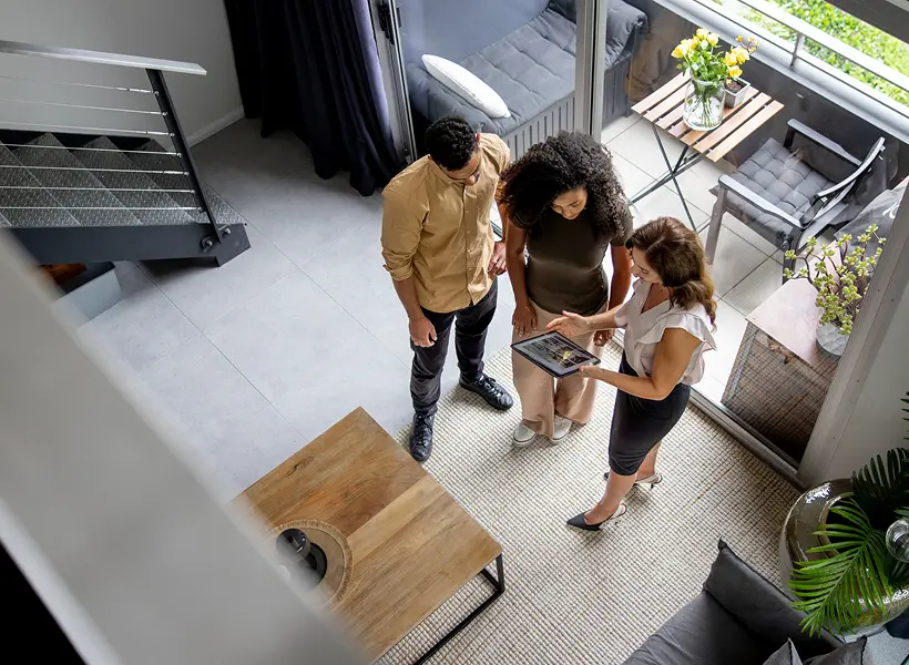 Group reviewing information on tablet