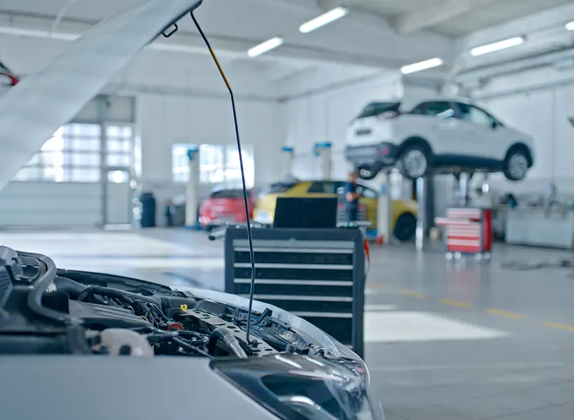 Mechanic workshop with cars on lifts